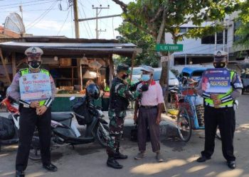 Satlantas Polres Kotim Bersama TNI Terus Bersinergi Untuk Cegah Covid-19
