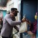 Polisi Distribusikan Bansos Kepada Warga Terdampak Covid-19 Ditengah PPKM